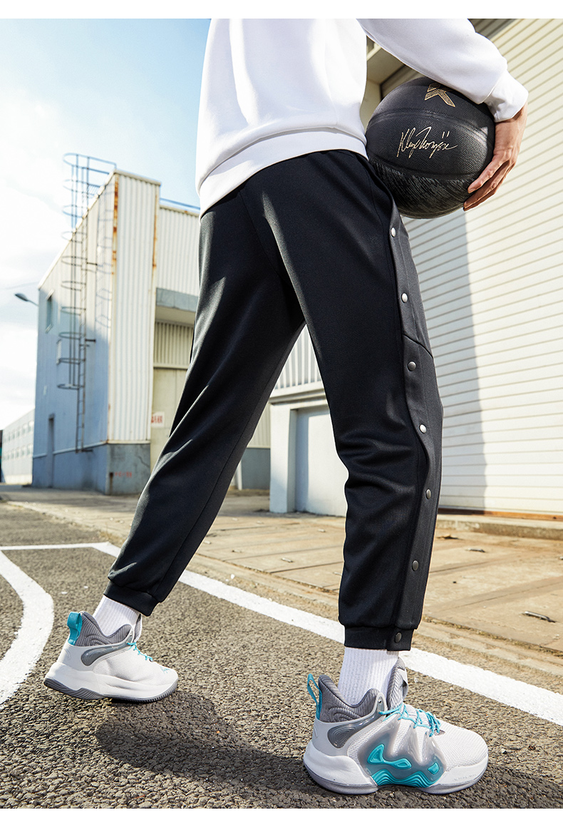 安踏排扣裤男裤2022春季新款运动裤篮球全开扣训练扯裤宽松束脚男士