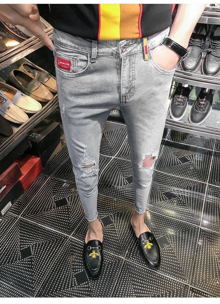 新款九分破洞牛仔裤男修身小脚裤学生社会精神小伙紧身乞丐裤男潮