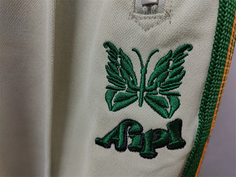 ea潮牌needles x aip 刺绣logo蝴蝶裤男女同款日系复古校服裤休闲长裤