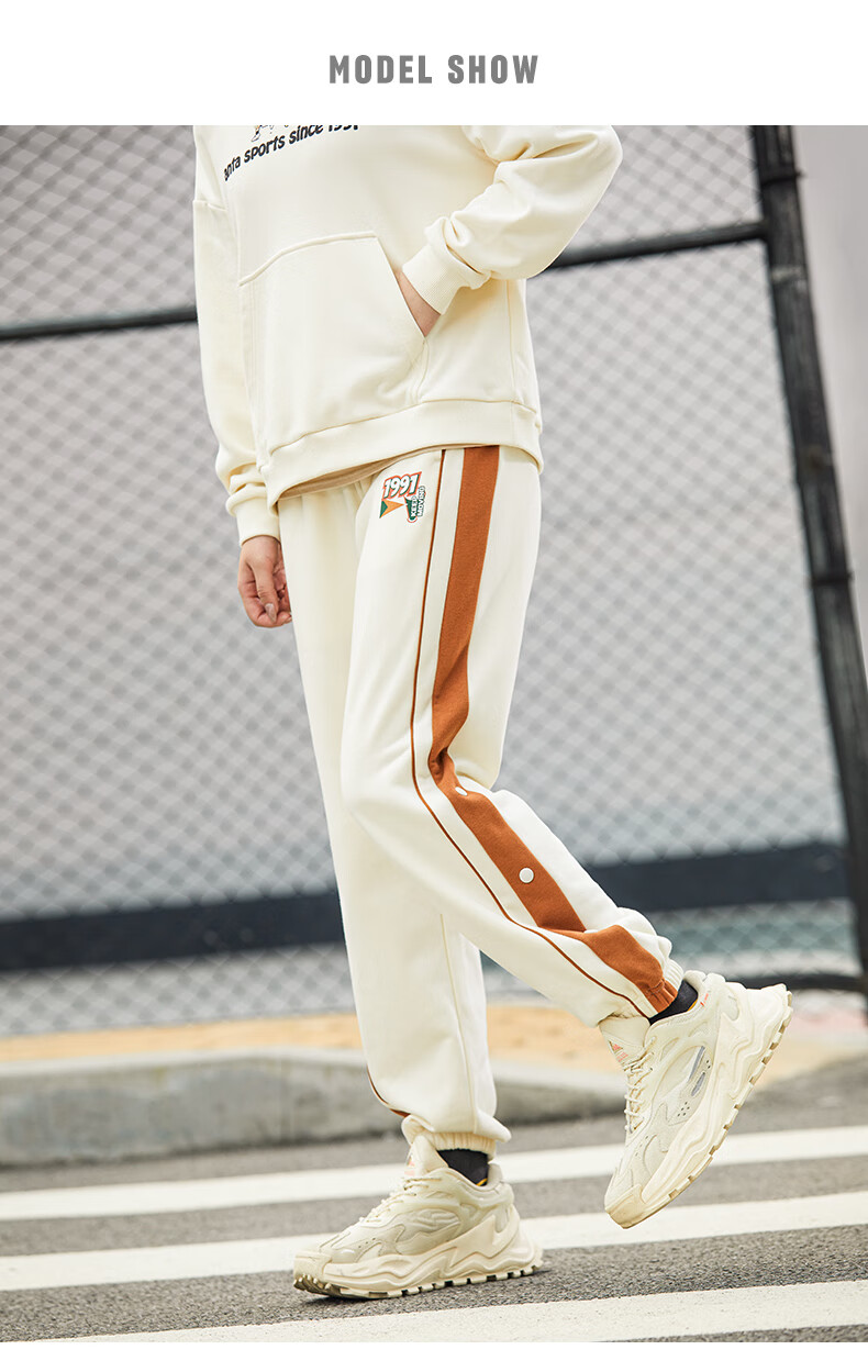 安踏(anta) 运动裤女排扣裤2022夏季新款女子针织长裤宽松收口束脚