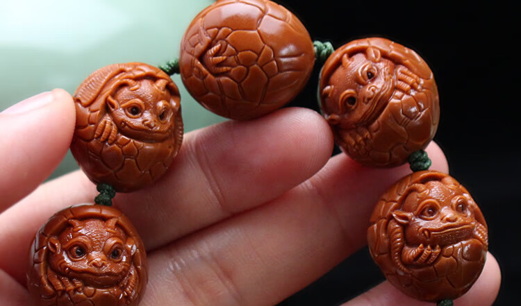 9大籽铁核龙宝宝橄榄胡龙蛋文玩手串男女士【图片