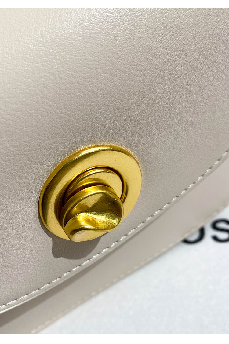 香港mackjhosel真皮感马鞍包2022新款小众设计撞色手提包斜挎海贝黄