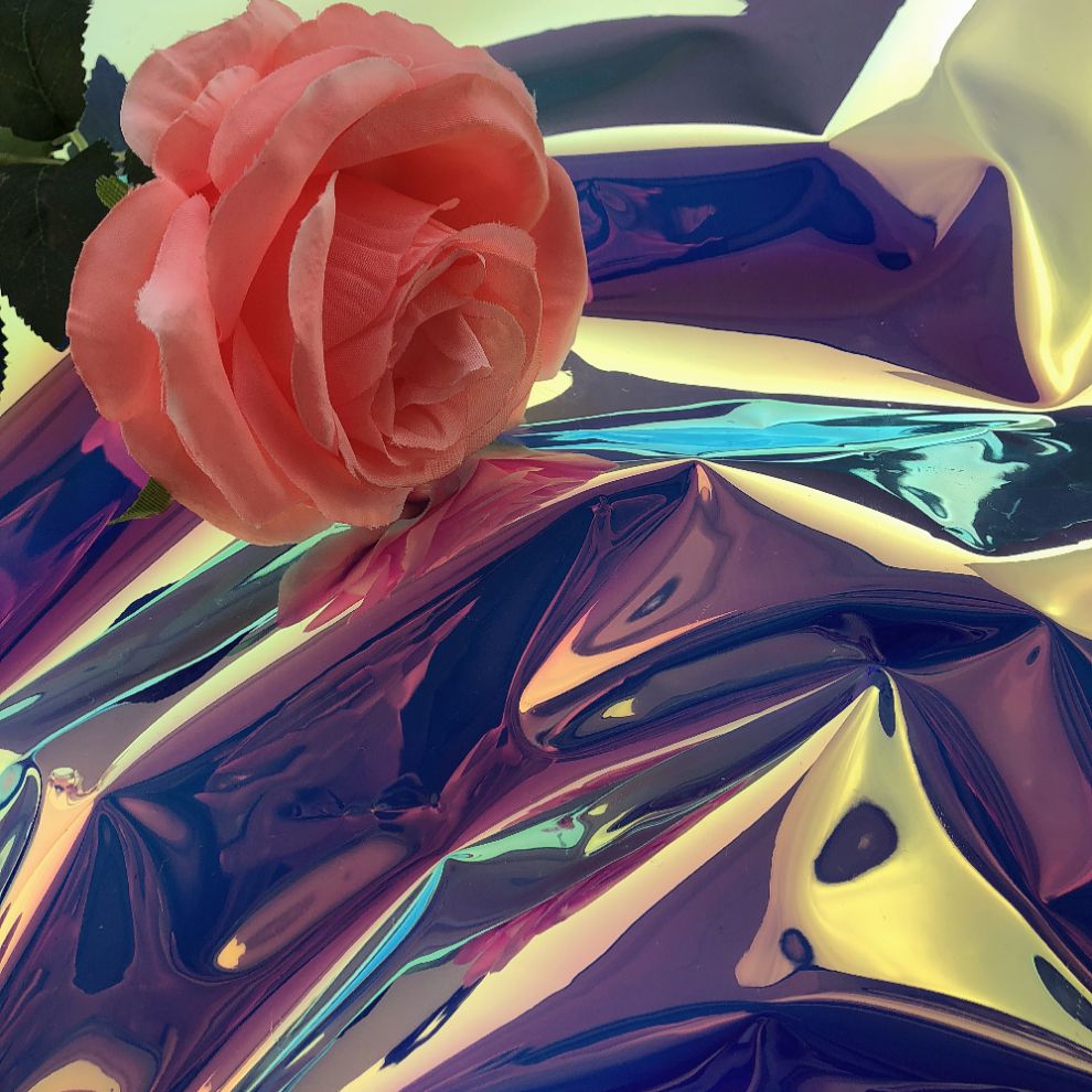 帆布布料防水布料透明pvc设计师面料镜面幻彩镭射七彩荧光服装包袋